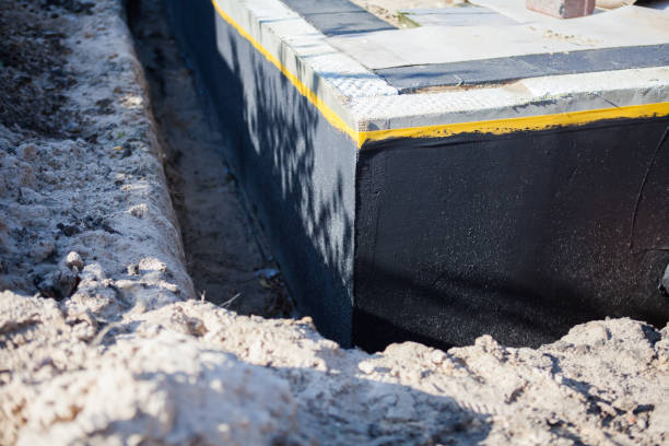 Professional Waterproofing technician working in Rochester, MI